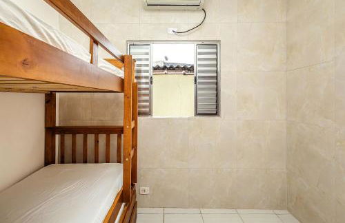 Casa confortável para Famílias e Grupos com Ar-condicionado em Praia Grande - Foto 20