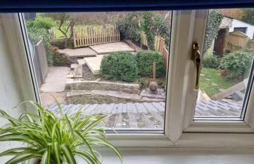 1750's cottage with open fire and beams - Foto 39