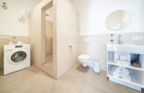 Design Apartment mit kostenfreiem Garagen Parkplatz im Zentrum - Foto 10