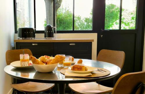 Montmartre en rez-de-jardin - Foto 15