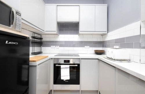 JOIVY Charming Apartment near Leith Links with Patio - Foto 24