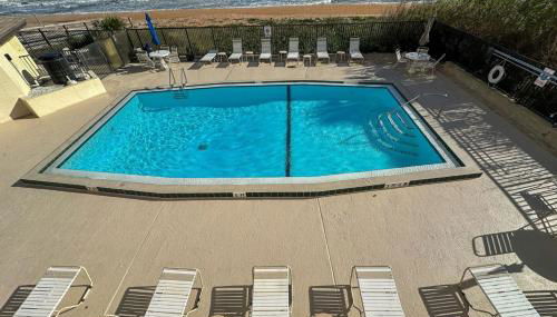 Luxury direct oceanfront corner with a large private balcony, heated pool and garage - Photo 5