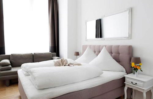 SC 06 by ROCKCHAIR Apartments l SUPERHOST Status l 4 Bedrooms Boxspringbeds 2 Bathrooms Balcony Elevator - Cozy Family & Business Flair welcomes you! - Foto 14