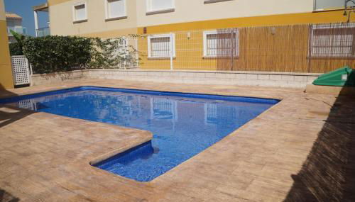 Adosado con piscina a 6 min del MET Oliva Nova y playa - Photo 2