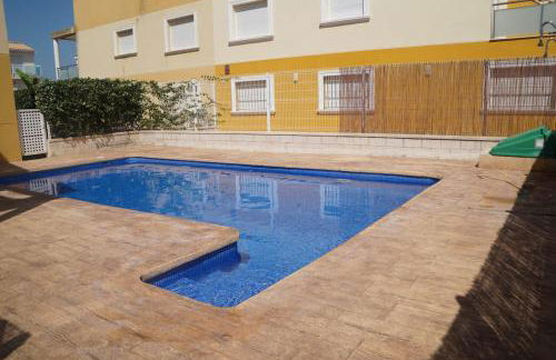 Adosado con piscina a 6 min del MET Oliva Nova y playa - Photo 2