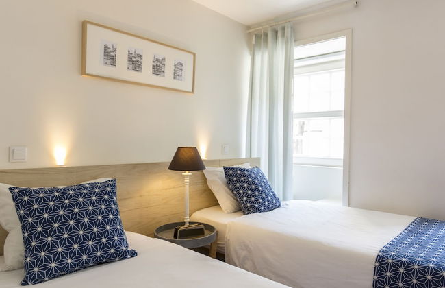 Bright 3BR Flat w/ AC in City Center by LovelyStay - Photo 21