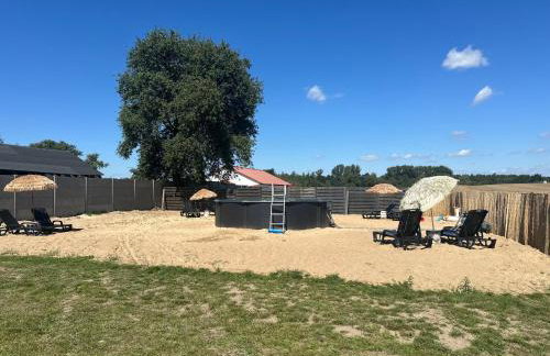 Domek nad jeziorem Wilczyńskim dla czterech osób, sypialnia z łożem małżeńskim oraz salon z rozkładanym narożnikiem - Photo 22