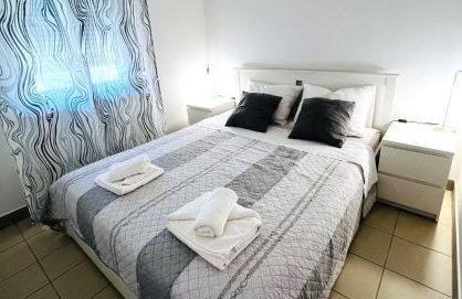 Sun n' Fun Apartments with Pool - Photo 17