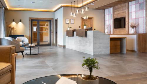 MGM Hôtels & Résidences - Résidence Chalets de Joy - Foto 3, Lobby or reception