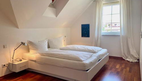 Ferienwohnung Seeblick - exklusive Wohnung in erster Reihe mit Balkon und Seeblick - Photo 3