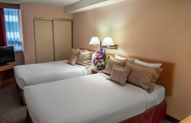 Cartier Place Suite Hotel - Photo 4