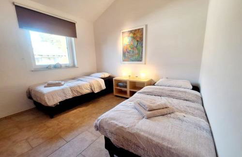 Luxuriöses, familienfreundliches Ferienhaus ,,Amy,, mit Whirlpoolwanne, Kamin und Garten - Foto 33