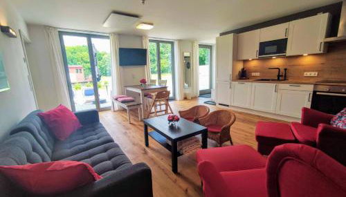 Erdhaus WEST - Ferienhof Bartel - Photo 2, stove, minibar