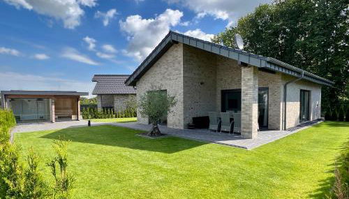 Schönes Ferienhaus mit Sauna am Harkebrügger See in der Nähe von Oldenburg - Foto 2