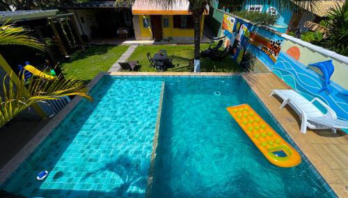 Recantos Pinheiros - Casa inteira, até 15 hóspedes - Piscina privativa, sinuca, ar condicionado e TVs nos 4 quartos - Condomínio Orla 500, lado praia - Unamar, Cabo Frio-RJ - Foto 2, sunbed