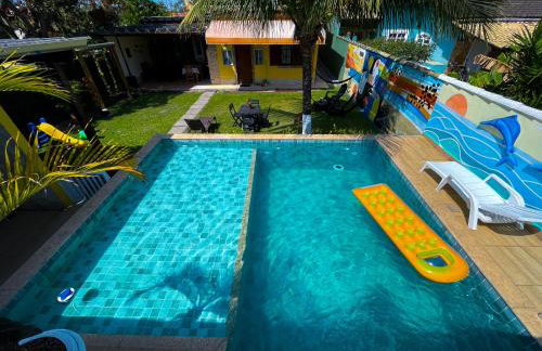 Recantos Pinheiros - Casa inteira, até 15 hóspedes - Piscina privativa, sinuca, ar condicionado e TVs nos 4 quartos - Condomínio Orla 500, lado praia - Unamar, Cabo Frio-RJ - Foto 2