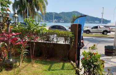 Apto frente à praia, aconchegante, vista lateral pro mar! - Foto 7