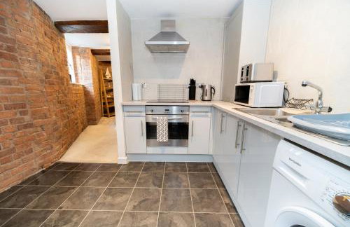 Rustic 2BR Loft Exposed Brick & Beams - Foto 10