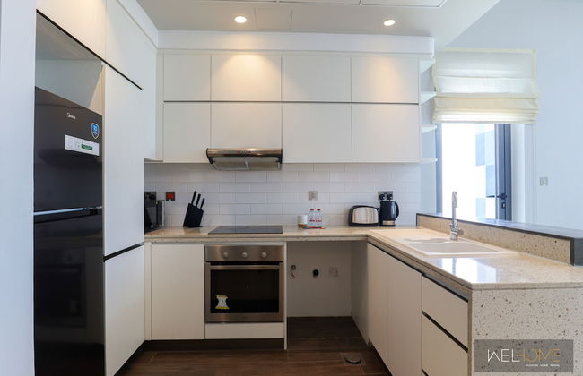 WelHome - Prime 1BR Apartment at Oia Residence - Photo 10