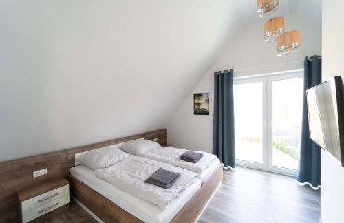 Haus Seerose direkt am Harkebrügger See Neubau! - Foto 12