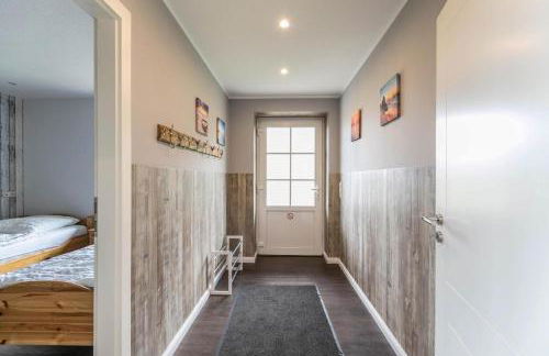 Modernes Holzhaus mit traumhaftem Deichblick - Foto 26