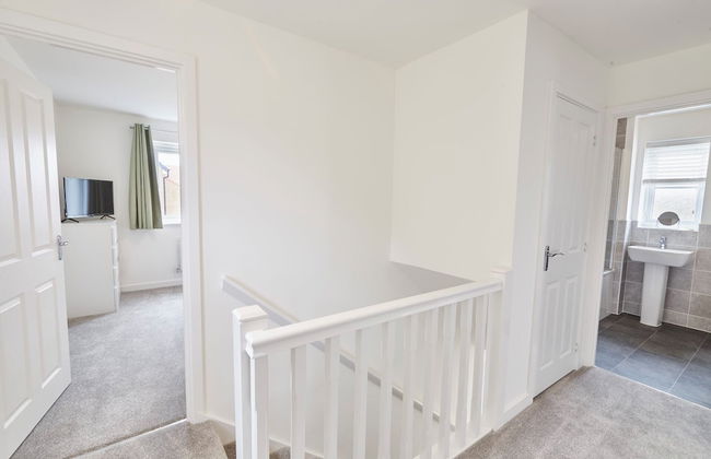 Host Stay Cayton Bay Cottage - Foto 1