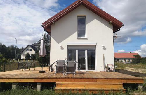 Dom nad jeziorem z prywatnym pomostem i linią brzegową - Foto 10