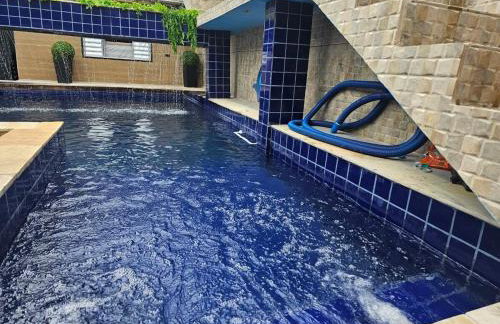 Casa com piscina na praia grande para temporada ou festas - Foto 15