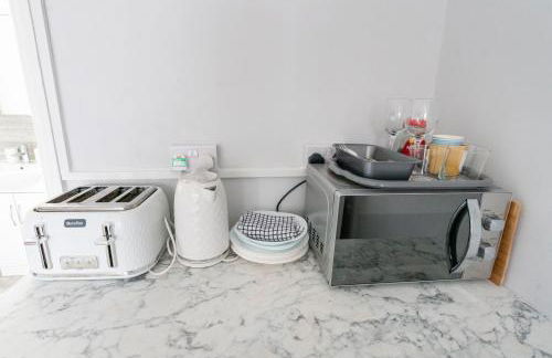 Beautiful en-suite room in a house with free on-street parking! - Foto 9