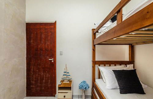 Casa confortável para Famílias e Grupos com Ar-condicionado em Praia Grande - Foto 27