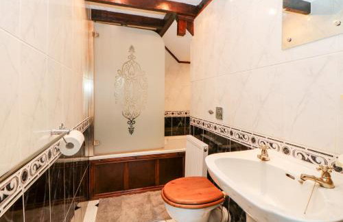 The Olde Coach House - Foto 13