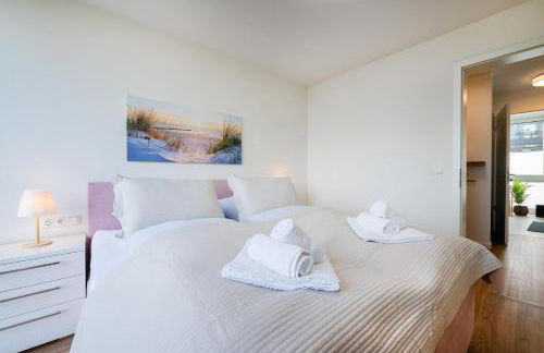 Hygge – Familienfreundliche Ferienwohnung mit Garten & Meerblick - Foto 24