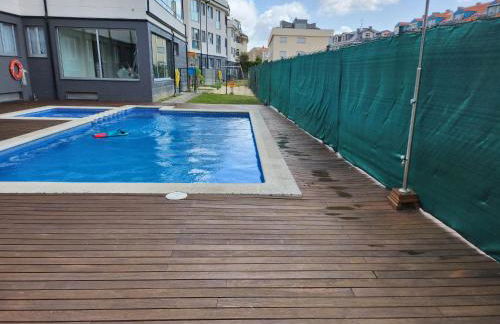 Apartamento de playa familiar, piscina y garaje. - Foto 18