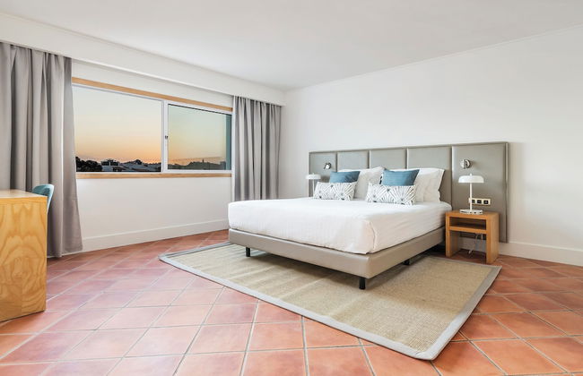 The Patio Suite Hotel - Photo 9