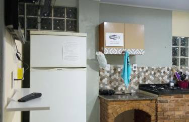 Casa quatro com cozinha americana e quintal compartilhado - Foto 9