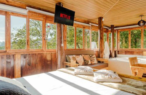 Chalé romântico com banheira aquecida - Foto 25