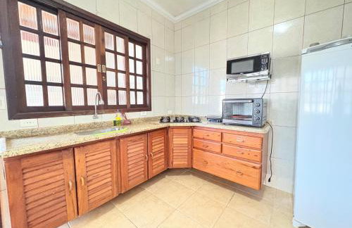 CASA ACONCHEGANTE e PERTINHO DA PRAIA - Foto 23