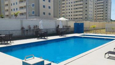 FLAT ACONCHEGANTE poucos min da praia - Foto 1
