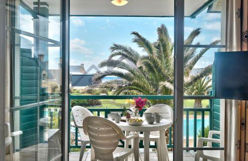 LocaLise - A18 - Appartement avec balcon - Petite vue mer à travers le palmier - Piscine de avril à septembre - Wifi inclus - Animaux admis - Draps inclus - Parking inclus - Foto 15