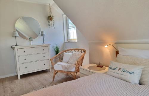 Düne 4 - Ferienunterkunft mit eigenem Garten in der beliebten Dünenresidenz - sanftes Meeresrauschen inklusive - Foto 16