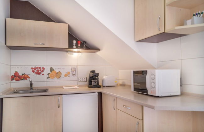 Oázis Apartmanok - Foto 11