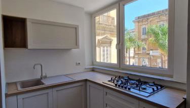 Ten Apartment - Foto 5, stove