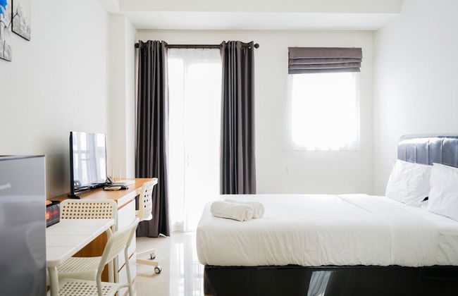 Homey Studio Signature Park Grande Apartment - Photo 18