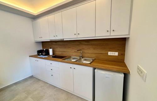 Nostos Suites Kamari - Foto 38