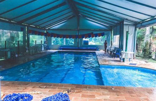 Casinha charmosa em condomínio, com piscina e muita natureza - Photo 12