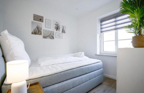 Sonnenterrasse - Helle & moderne Ferienwohnung am Meer - Foto 14