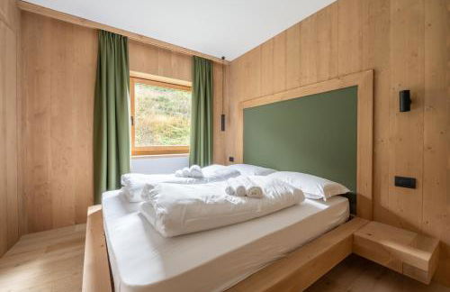 Ama Dolomiti - Residence - Photo 24