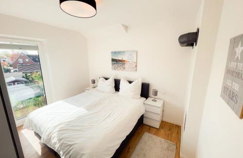 Meerzeit - Sauna und Kamin - moderne FeWo - Foto 8