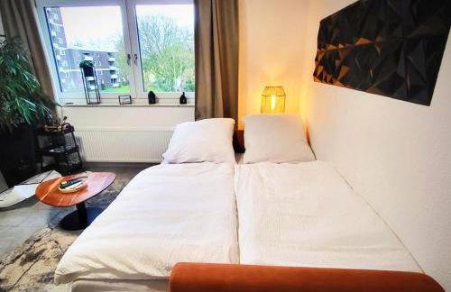 Getaway Apartment mit Balkon - Ruhiges Business-Apartment - direkte S-Bahn nach Messe DUS & ESS - Foto 7