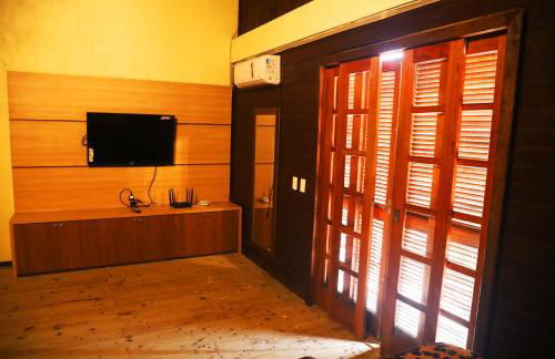 Chalé com Piscina Aquecida - Vista Panorâmica da Praia, a 200m do Mar, Sala de Jogos, Academia e Churrasqueira - Photo 19